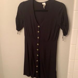 H&M black dress, ruched sleeves, buttons down the front.